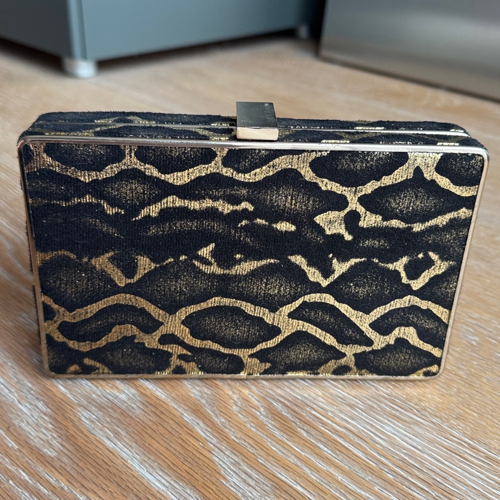 BCBGMaxAzria Animal Print Black and Gold Handbag with detachable strap